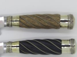 Cuchillo con cabo de madera torneada, alambre y terminaciones en alpaca